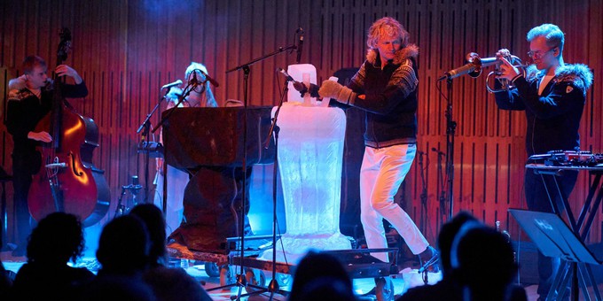 Arctic Ice Music - Terje Isungset performs ice percussion with a band. Photo by Justin Slee.