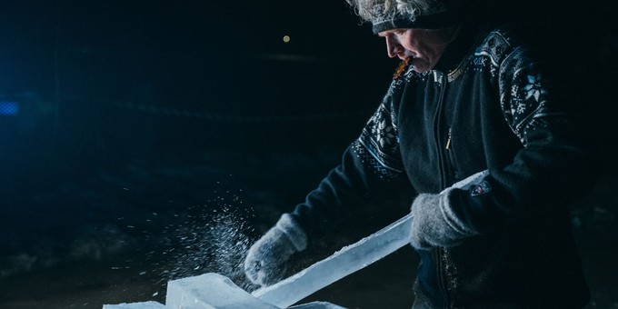 Ice instrument carving - Terje carves ice to create an ice horn.
