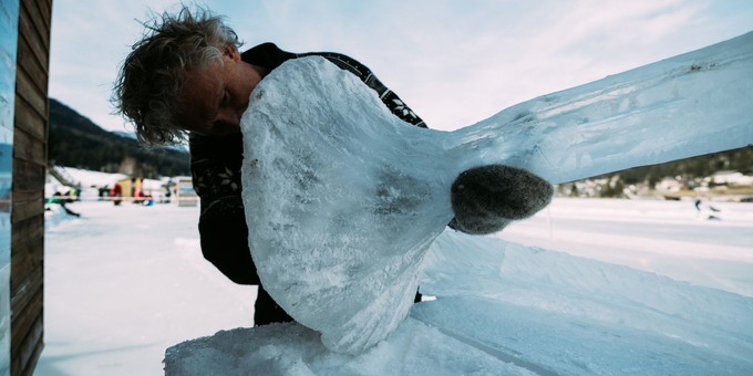 Ice instrument carving - Terje carves ice to create an ice horn.