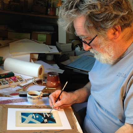Tom Phillips in his studio